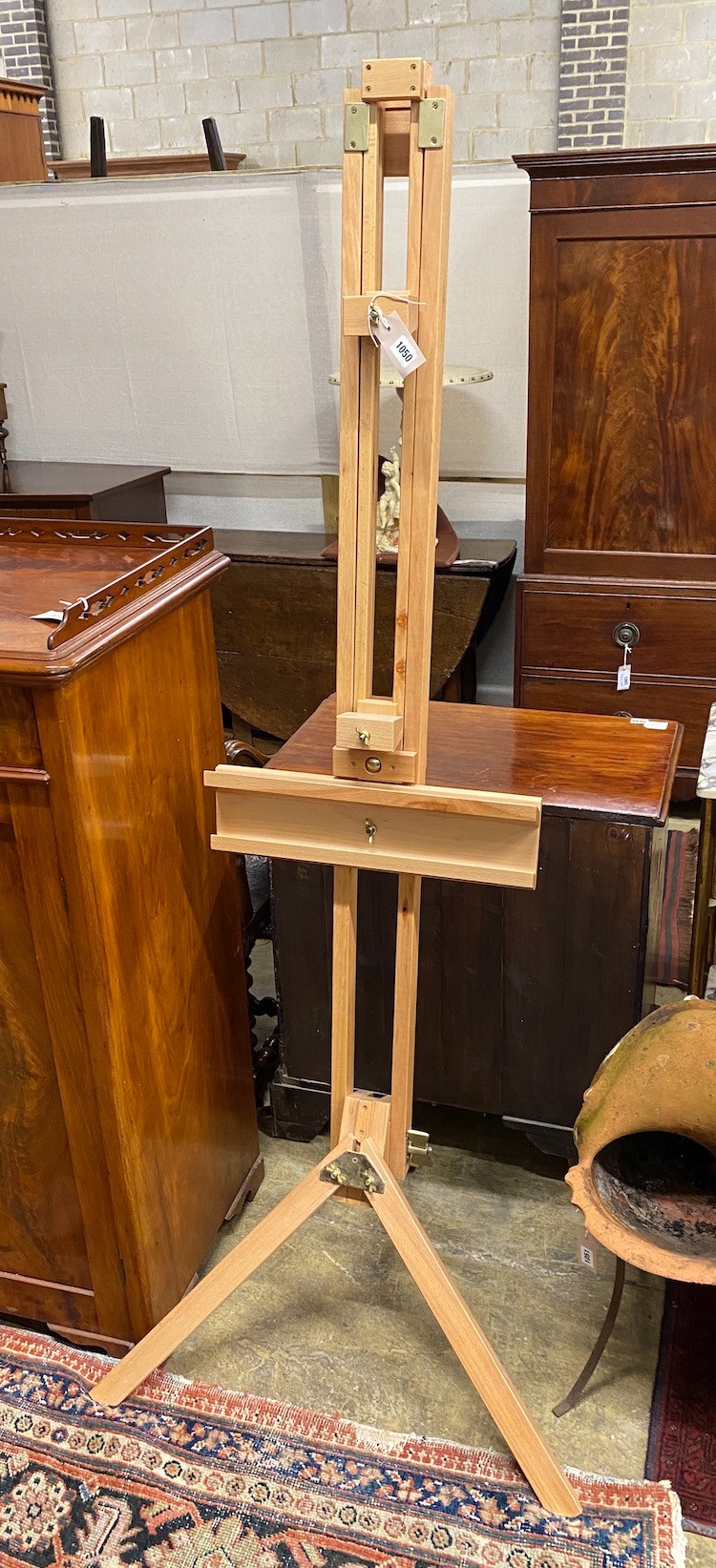 A modern brass mounted beech artist's studio easel, height 180cm